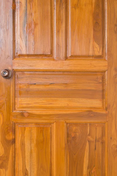 Bruin houten deur met deurknop — Stockfoto