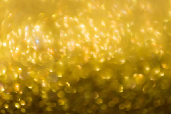 Fundo de ouro, abstrato bokeh luz de ouro feliz ano novo — Fotografia de Stock