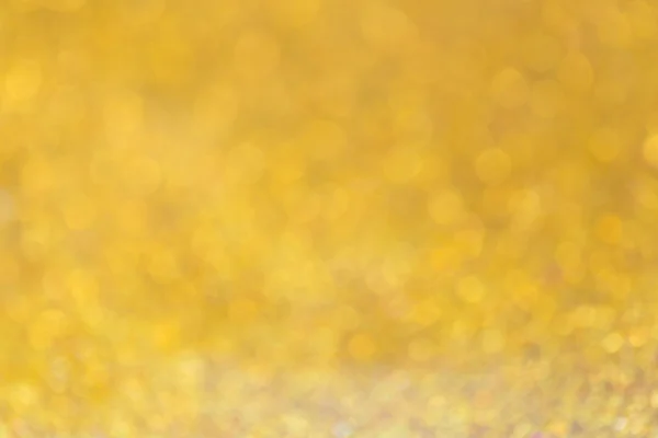 Zlaté pozadí, abstraktní zlatý bokeh lehké oslava — Stock fotografie