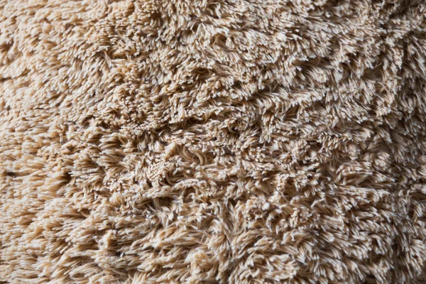 Primer plano lana marrón esponjoso piel textura fondo —  Fotos de Stock