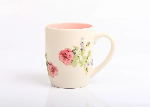 Mug with rose flower pattern isolated — Stock Photo, Image