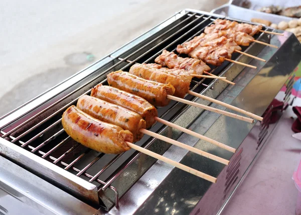 Grilled pork and sausage — Stock Photo, Image