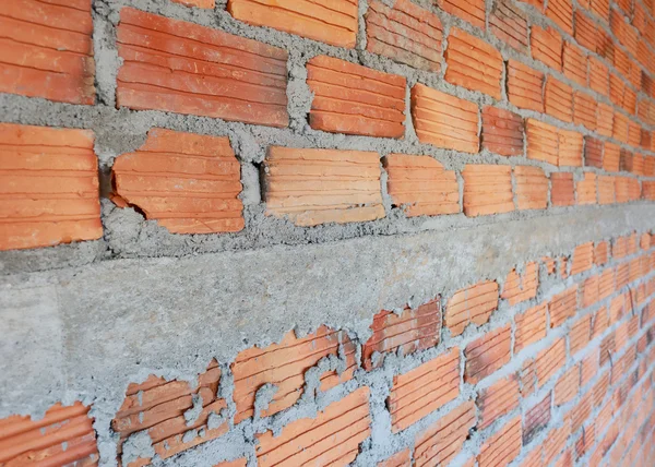 Muro de ladrillo en la construcción de edificios residenciales —  Fotos de Stock