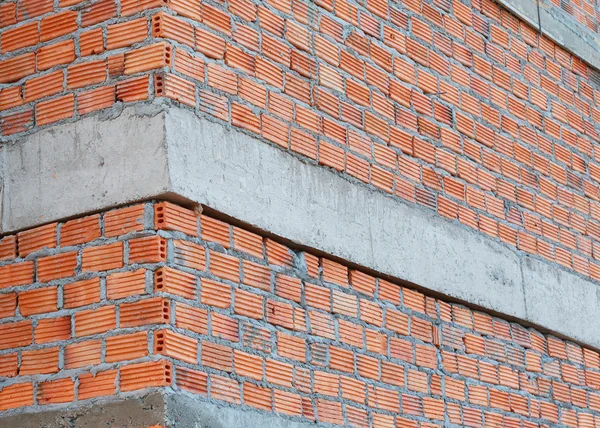 Muro de ladrillo en la construcción de edificios residenciales — Foto de Stock