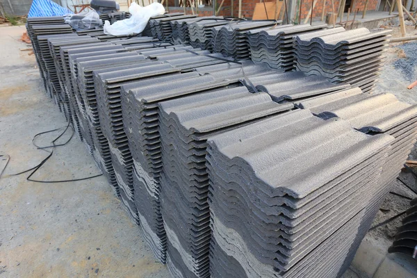 Black tiles roof in building construction site — Stock Photo, Image