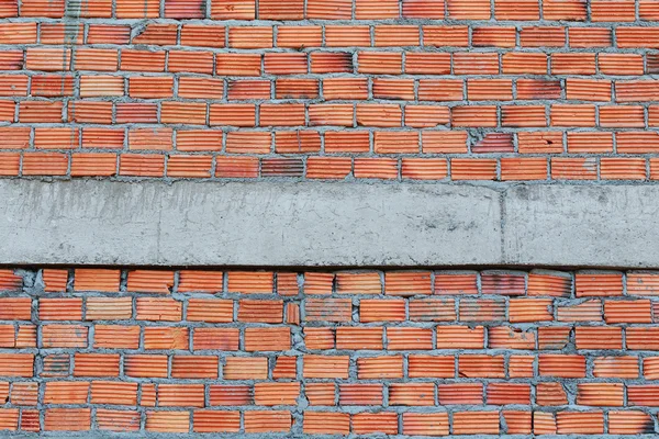 Muro de ladrillo en la construcción de edificios residenciales —  Fotos de Stock