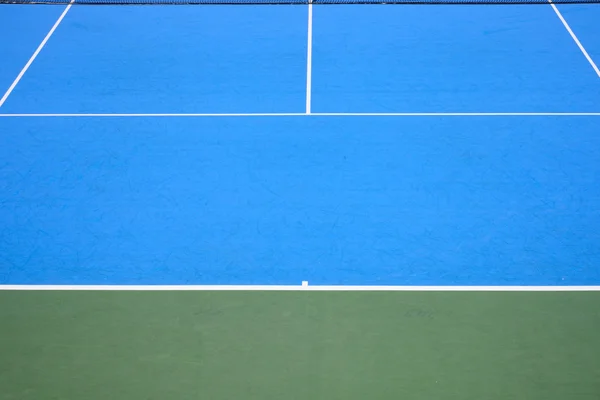Blauwe en groene tennis ondergrond — Stockfoto