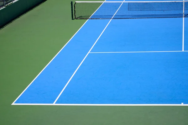 Blauwe en groene tennisbaan — Stockfoto