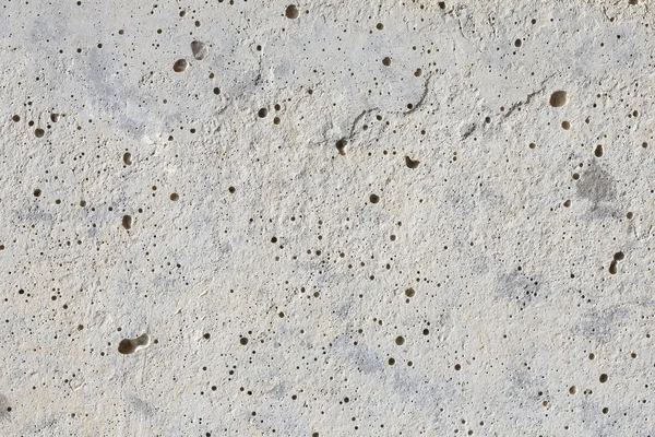 Пористая текстура цементной стены — стоковое фото