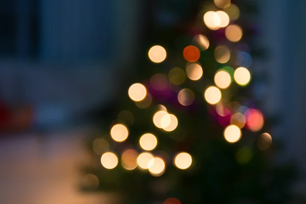 Abstract christmas background with defocused lights — Stock Photo, Image