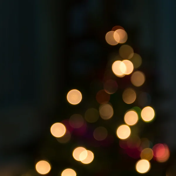Abstract christmas background with defocused lights — Stock Photo, Image