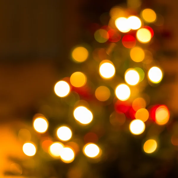 Abstraktní vánoční pozadí s rozostřenými světly — Stock fotografie