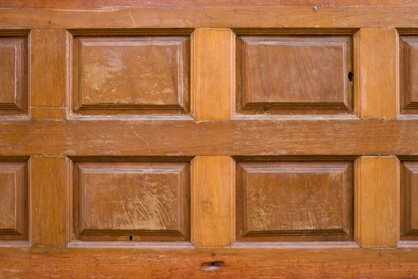 Madeira esculpida textura usado decorado parede fundo — Fotografia de Stock