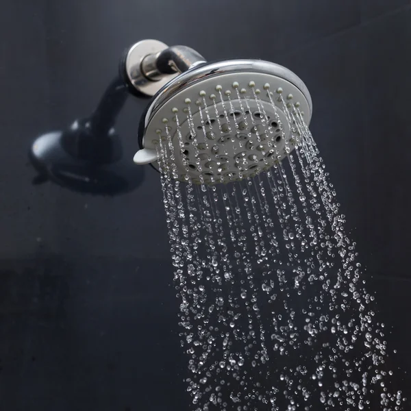 Cabezal de ducha con gotas de agua —  Fotos de Stock