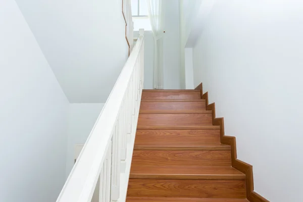 Wooden staircase made from laminate wood in white modern house — Stock Photo, Image