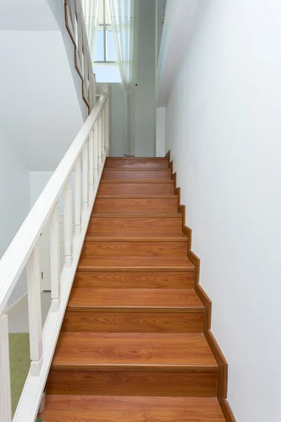 Wooden staircase made from laminate wood in white modern house — Stock Photo, Image