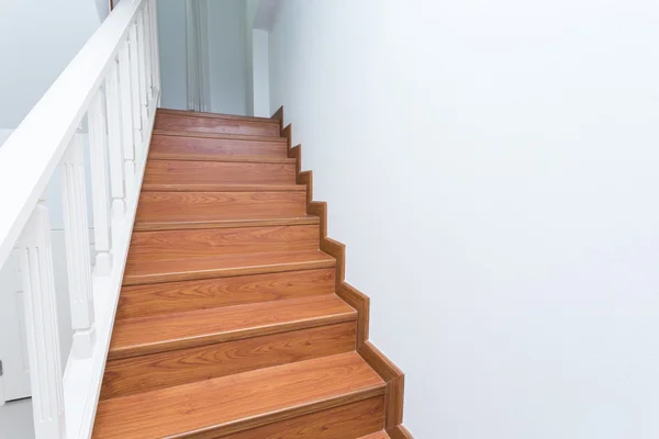 Wooden staircase made from laminate wood in white modern house — Stock Photo, Image