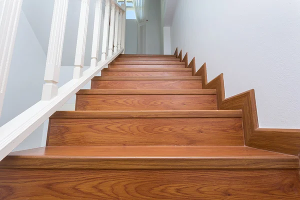 Wooden staircase made from laminate wood in white modern house — Stock Photo, Image