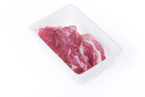 Raw pork in plastic box package isolated on white background — Stock Photo, Image