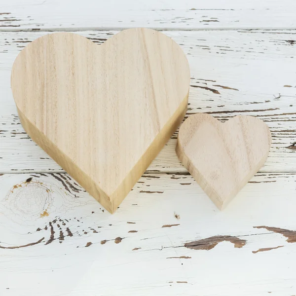 Heart wooden box on white wood background — Stock Photo, Image