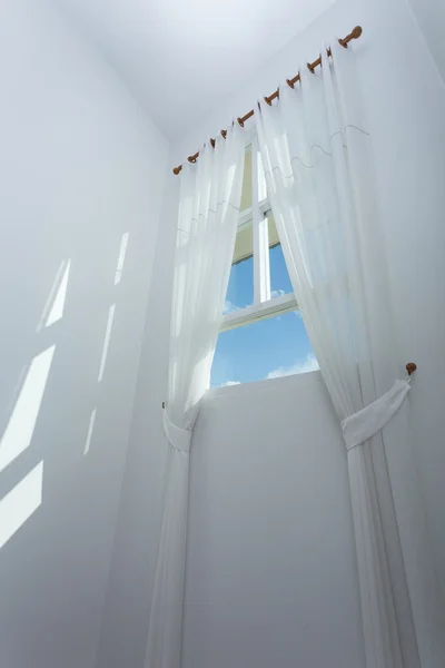 White curtain on the window with blue sky — Stock Photo, Image