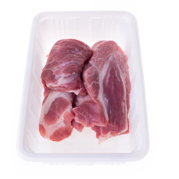 Raw pork in plastic box package isolated on white background — Stock Photo, Image