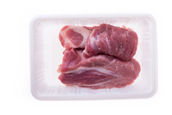 Raw pork in plastic box package isolated on white background — Stock Photo, Image