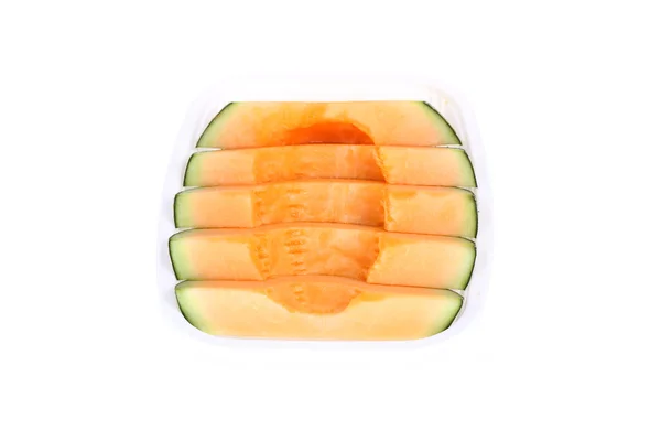 Melon kantalupa kromka na białym tle — Zdjęcie stockowe
