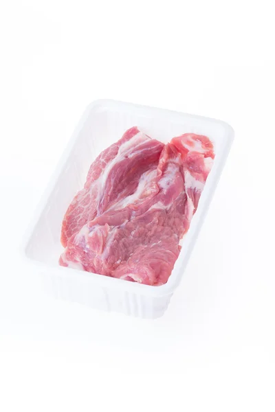 Raw pork in plastic box package isolated on white background — Stock Photo, Image