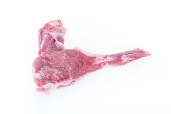 Beyaz arkaplanda çiğ domuz eti izole edilmiş — Stok fotoğraf