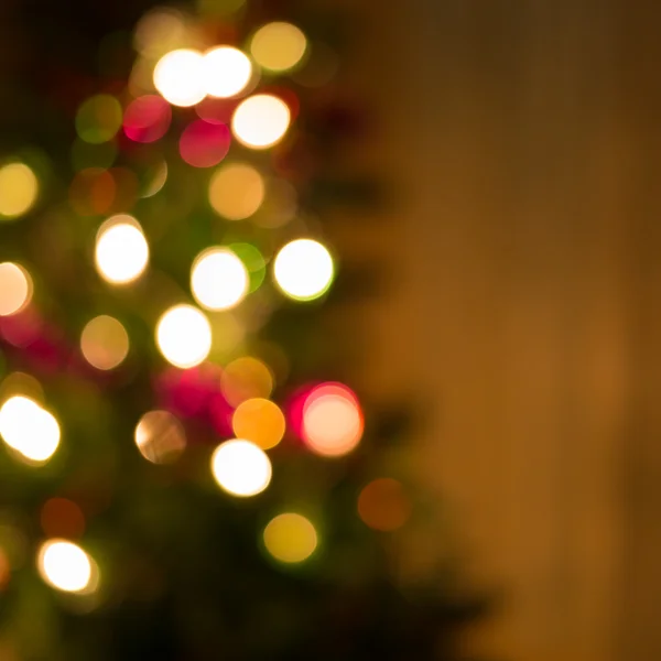 Abstract christmas background with defocused lights — Stock Photo, Image