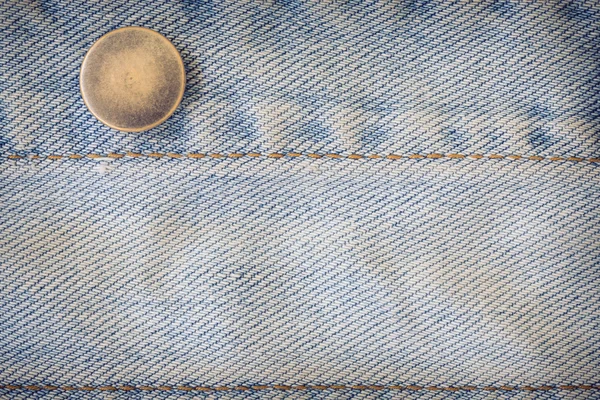 Jeans denim clothing with metal button on clothing textile indus — Stock Photo, Image