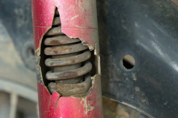 Motorcycle chock absorber rusty crack broken — Stock Photo, Image