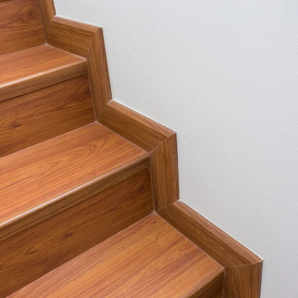 Wooden staircase made from laminate wood in white modern house — Stock Photo, Image