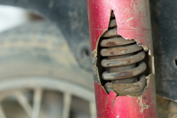 Motorcycle chock absorber rusty crack broken — Stock Photo, Image