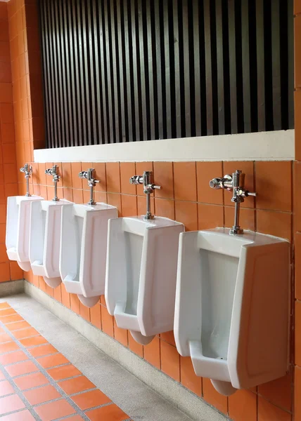 Decor interior of white urinals in men bathroom toilet — Stock Photo, Image