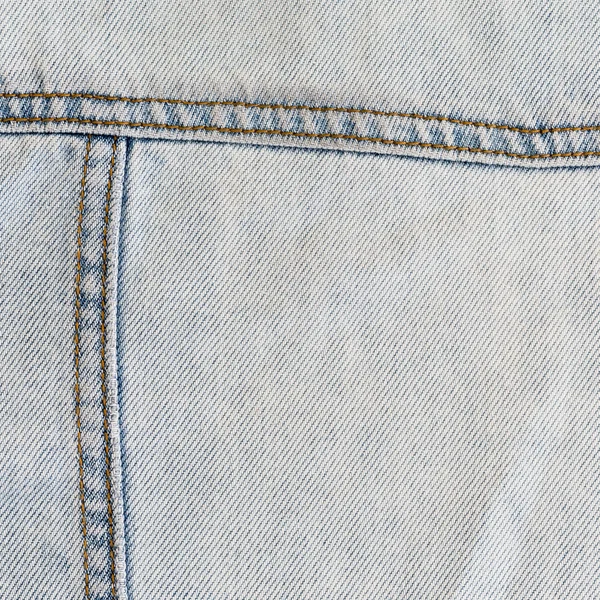 Jean konsistens kläder mode bakgrunden av denim textil — Stockfoto