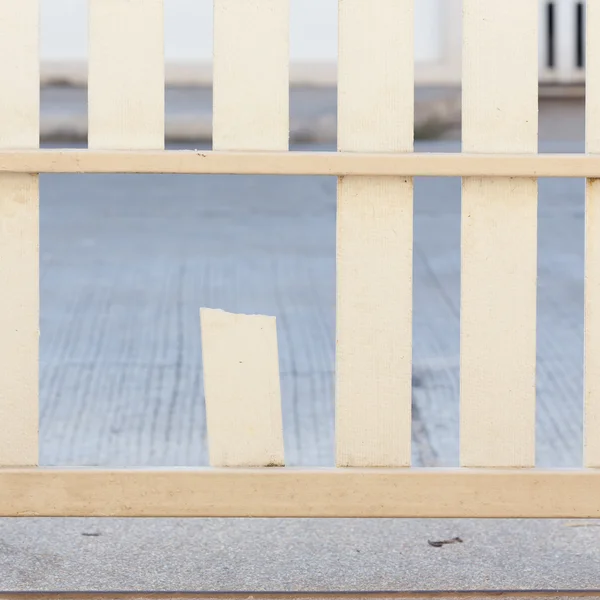 White wood fence of broken damaged — Stock Photo, Image