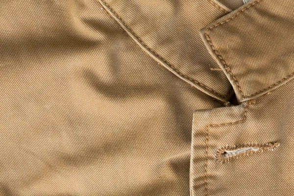 Camisa marrón tela textura fondo con diseño de cuello — Foto de Stock