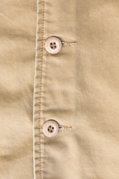 Brown shirt background with stitch seam textile and botton — Stock Photo, Image