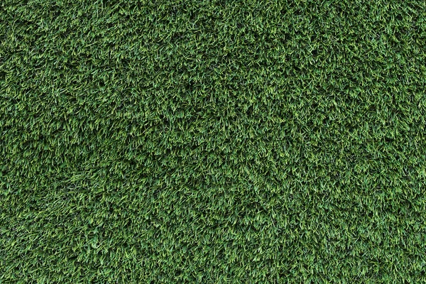Mesterséges zöld fű, a fű textúra háttér — Stock Fotó