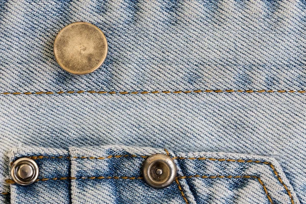 Jeans denim clothing with metal button on clothing textile — Stock Photo, Image