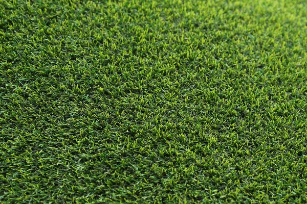Erba verde artificiale, sfondo trama erba — Foto Stock