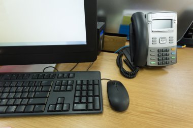 table work in office with telephone and computer pc clipart
