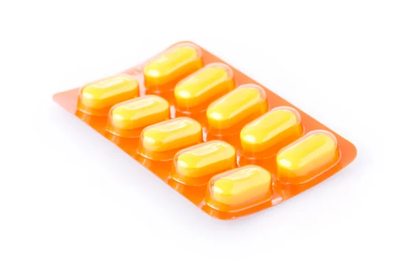 Pílulas de medicina isoladas em fundo branco — Fotografia de Stock