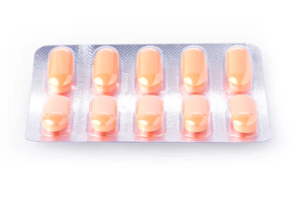 Piller av medicinsk isolerad på vit bakgrund — Stockfoto