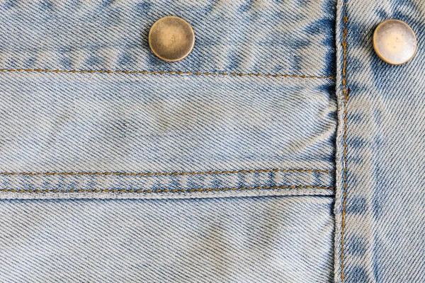 Jeans denim clothing with metal button on clothing textile — Stock Photo, Image