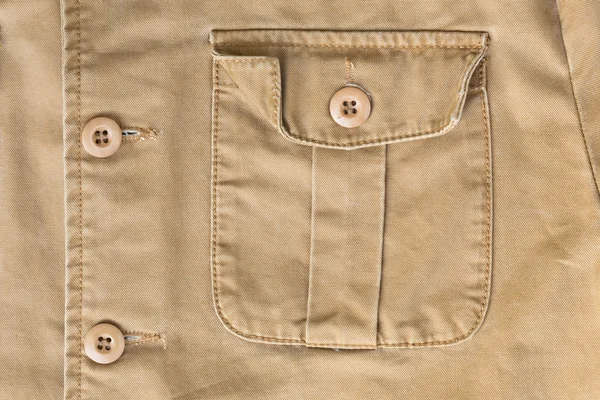 Μπροστινή τσέπη για καφέ πουκάμισο κλωστοϋφαντουργικών υφή φόντου — Φωτογραφία Αρχείου