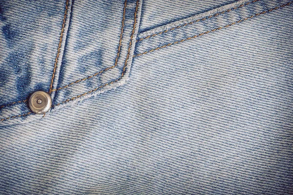 Jeans denim odzież z metalowy przycisk na ubrania tekstylne — Zdjęcie stockowe