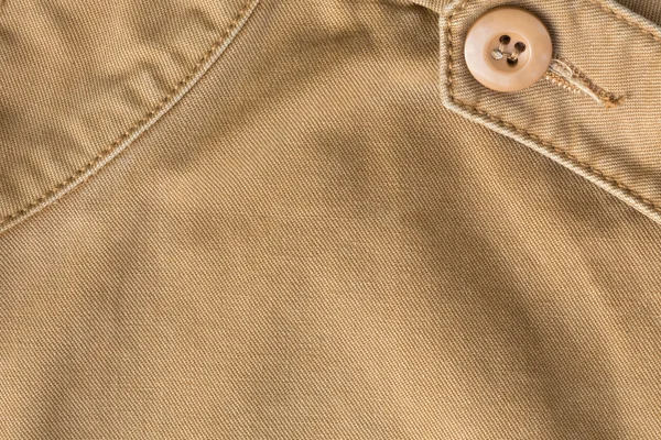 Коричневый фон текстуры ткани, материал текстильной промышленности — стоковое фото